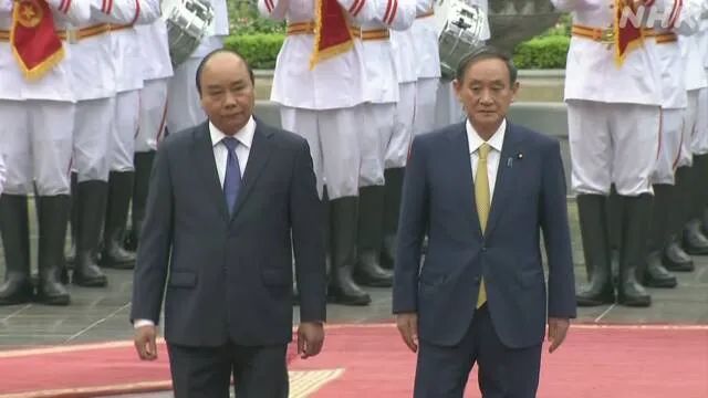  阮春福和菅义伟（右） 图源：NHK